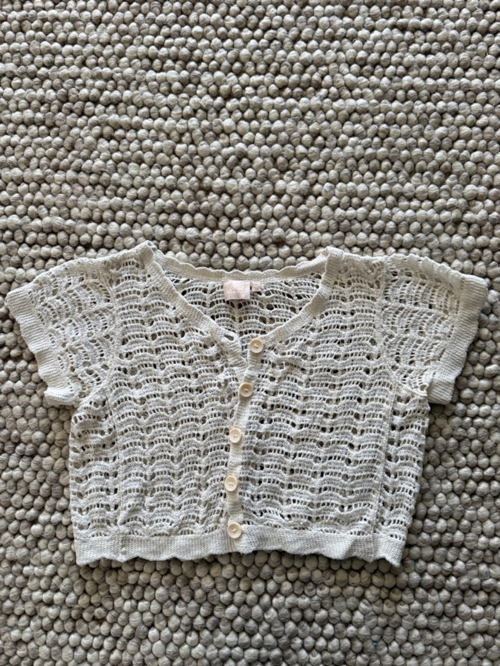 Good Luck Gem brand cream-colored crochet lace cropped cardigan top